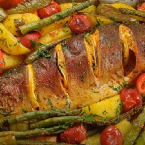 Păstrăv la cuptor cu paste spelta cu smanatana, sparanghel si ceapa verde